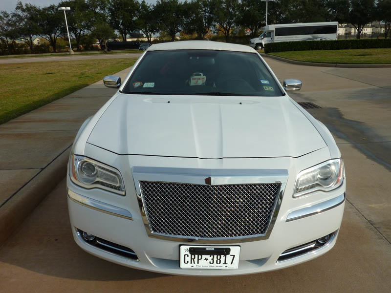 White Chrysler Limousine, part of the Destiny Limousine Service, Houston TX fleet